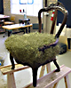Side chair showing traditional seat stitched with seagrass